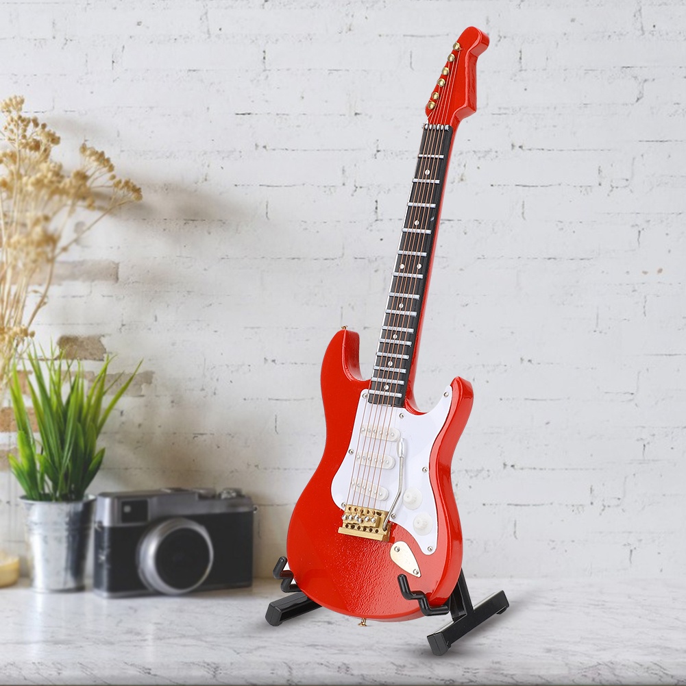 Miniature Red Electric Guitar  - Musical Instrument With A 评论和价格